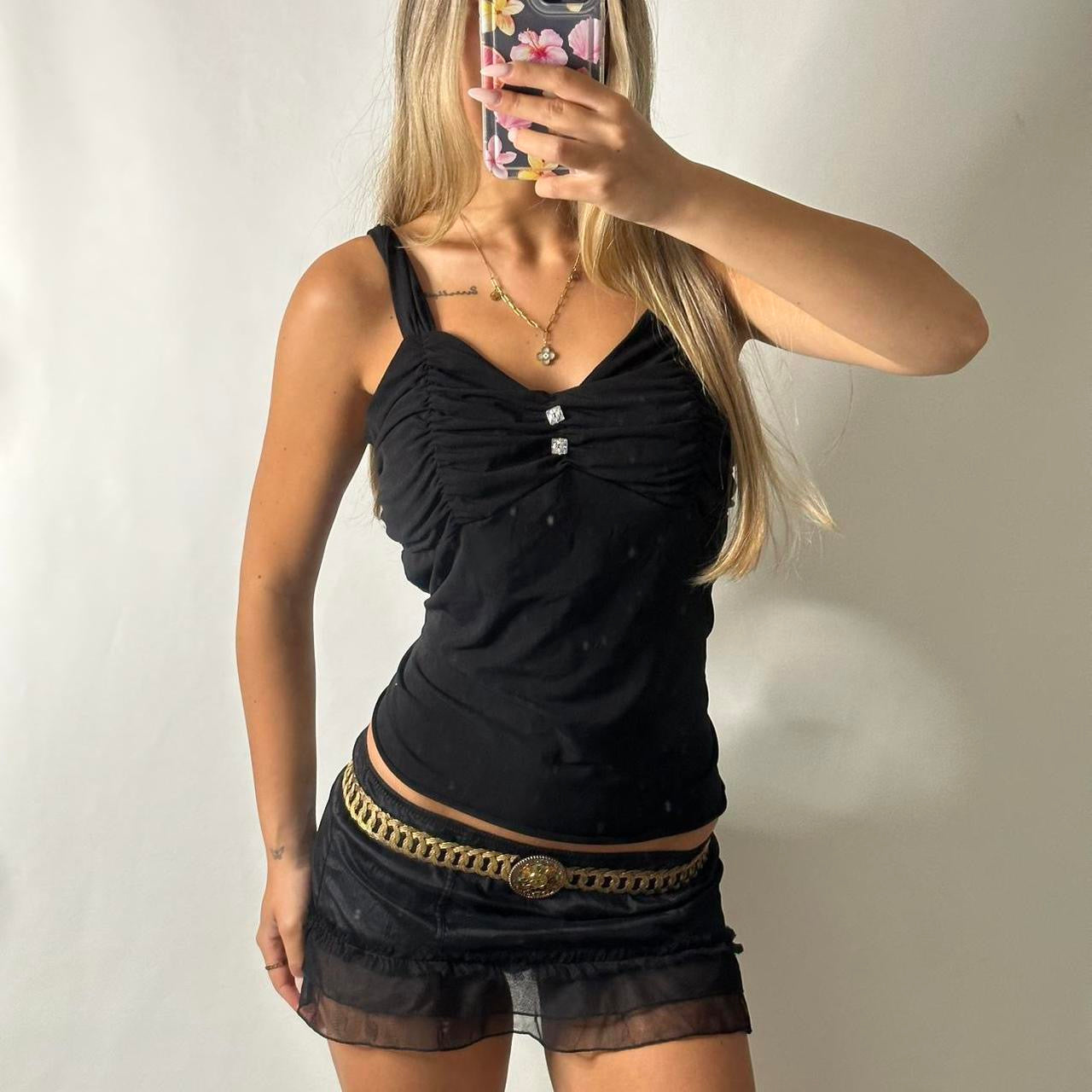 Ruched top with rhinestone button