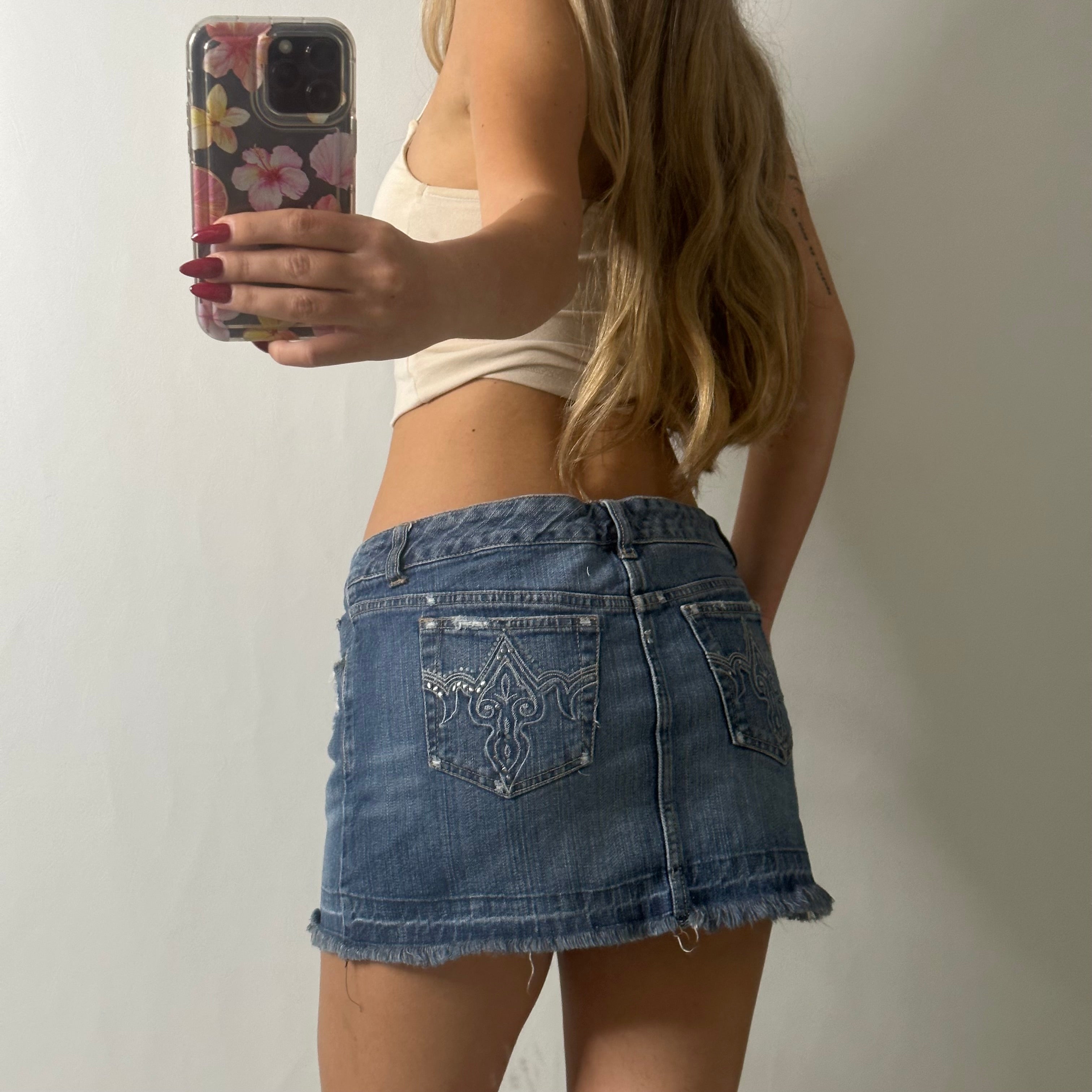 Low rise mini denim skirt