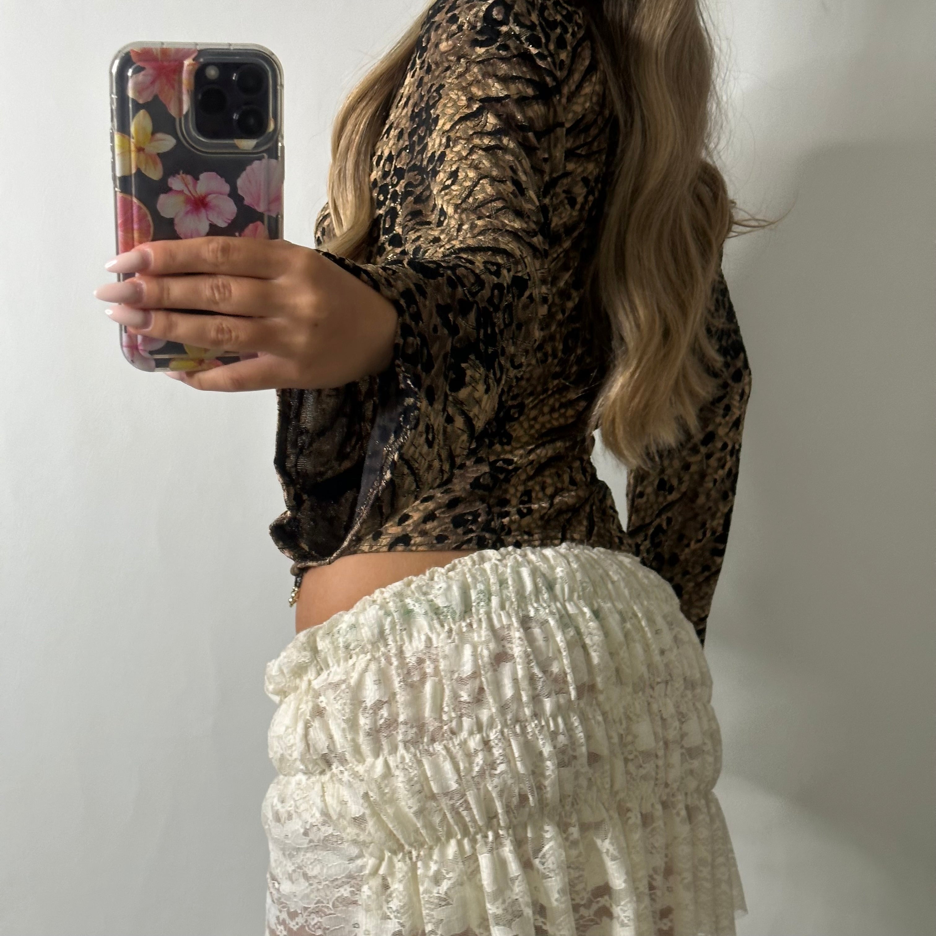 Wrap over animal print top with beads