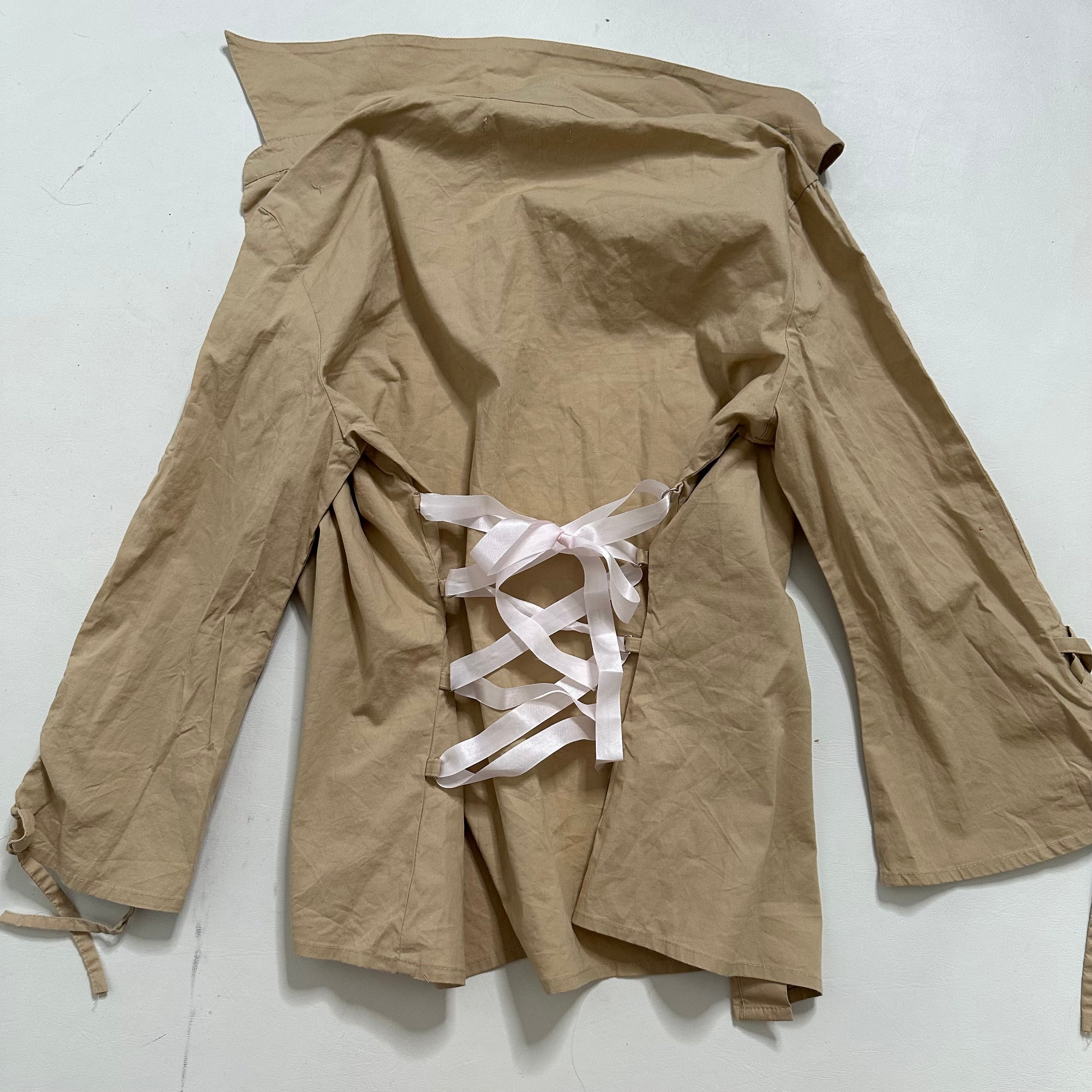 Fitted button up flared lace up shirt