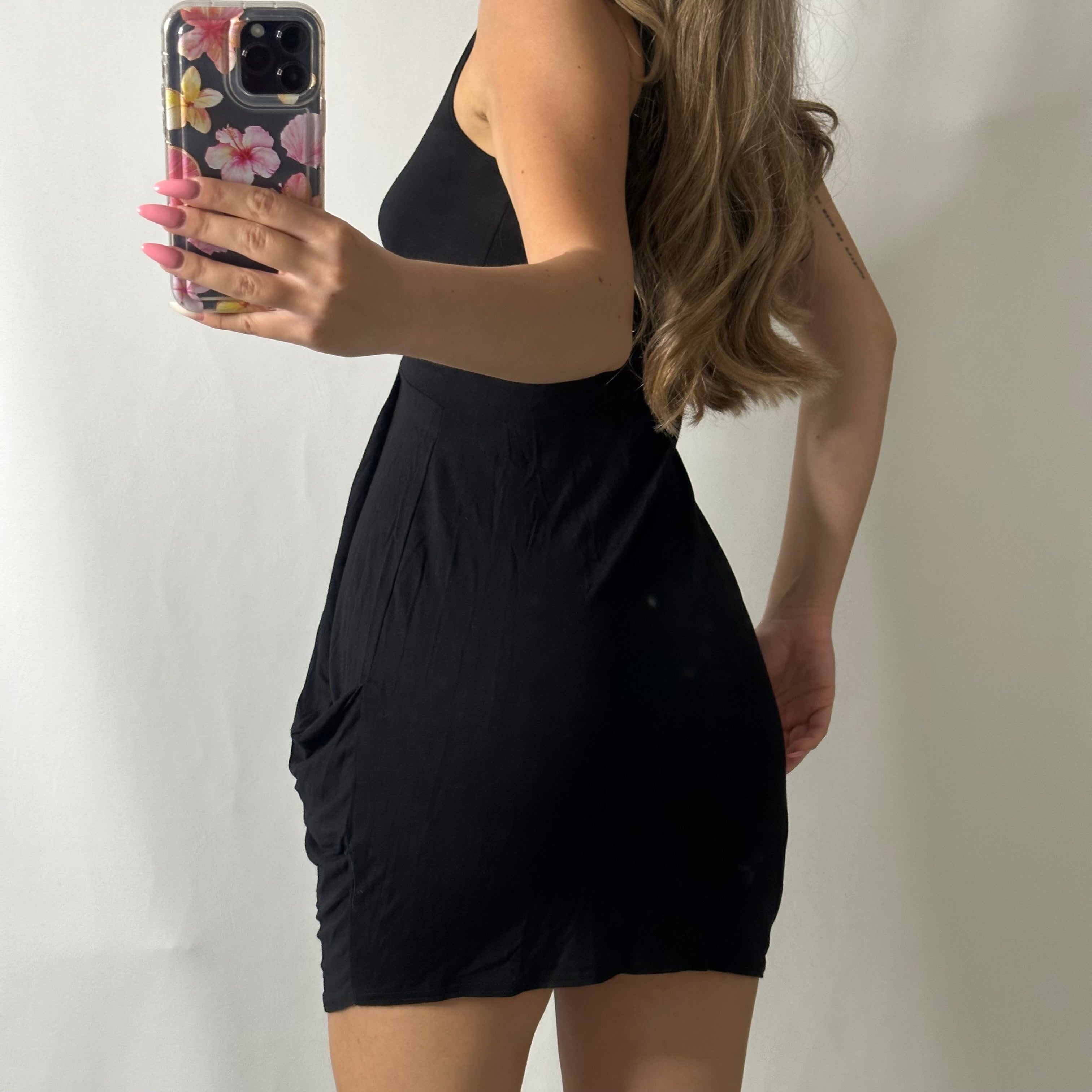 Slouchy body con mini black dress