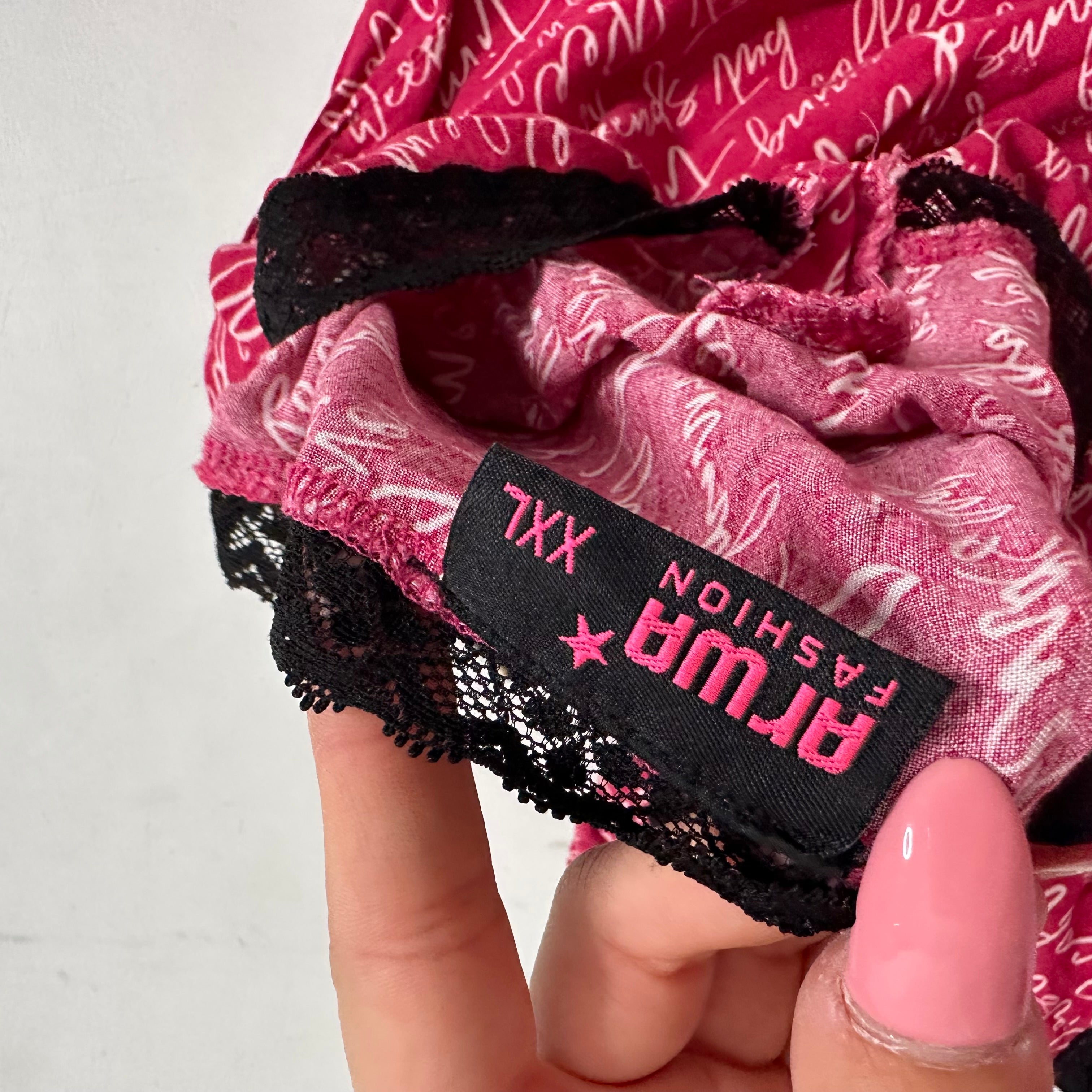 Black lace lined pink cami