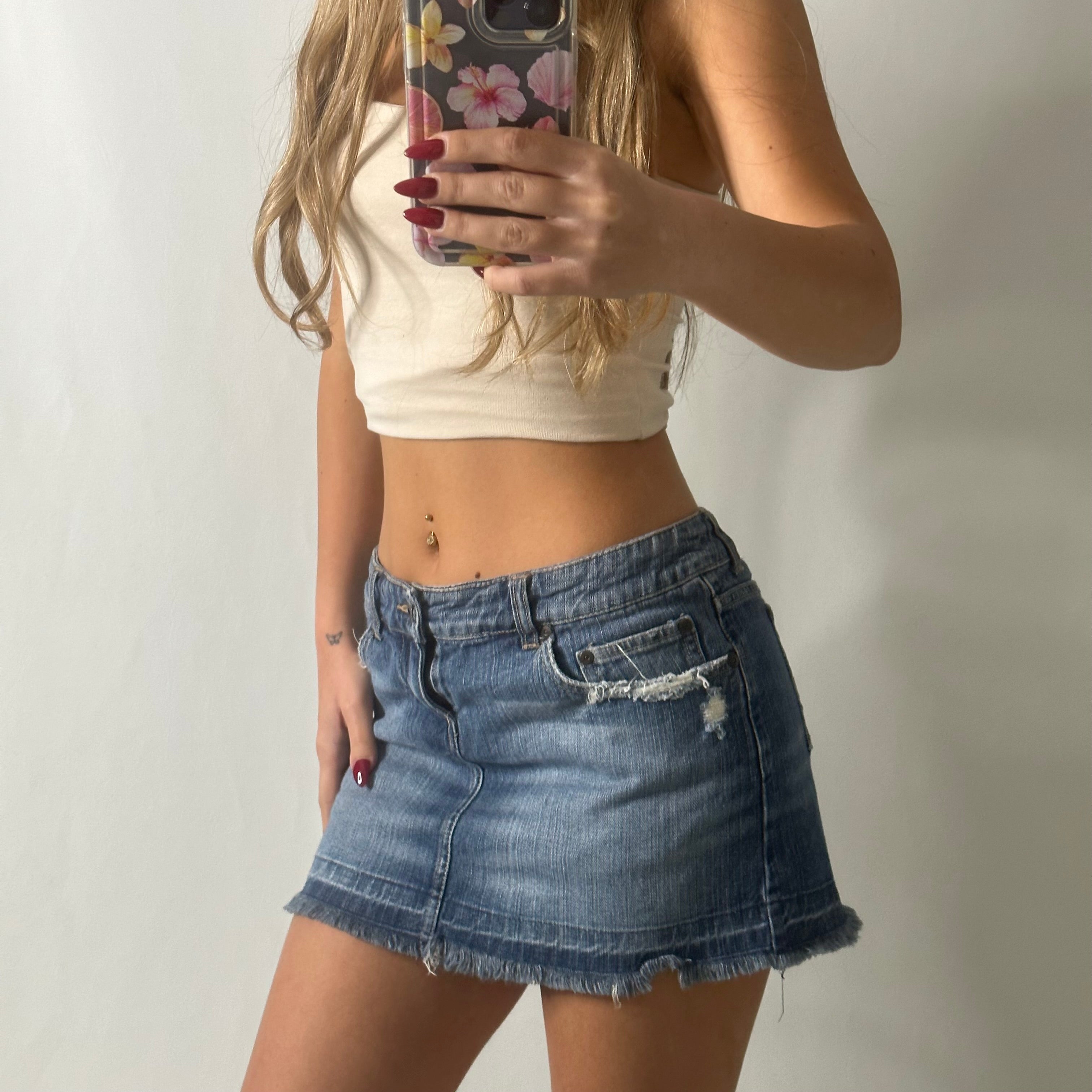 Low rise mini denim skirt