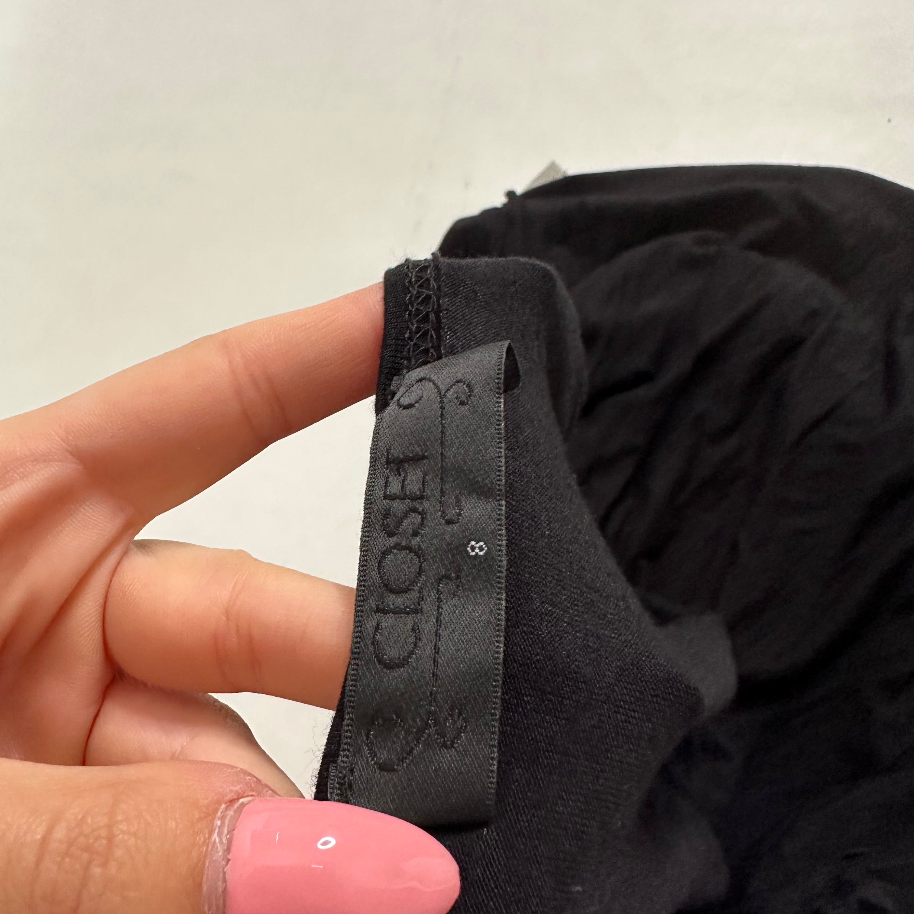 Slouchy body con mini black dress