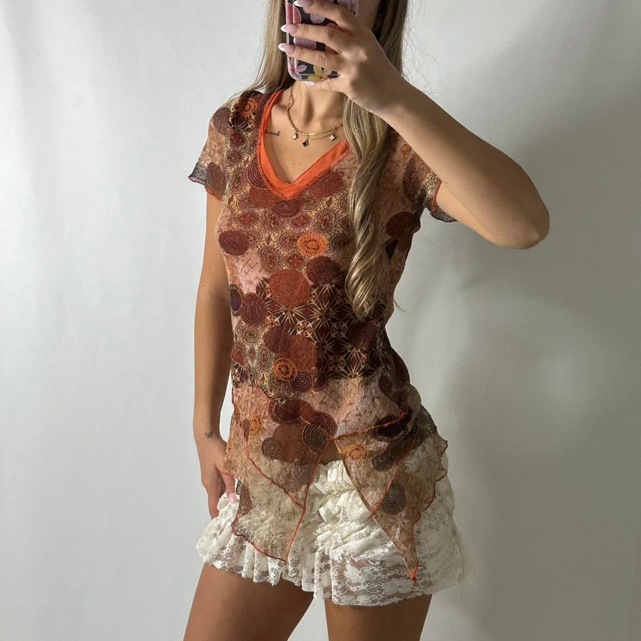 Mesh asymmetrical top