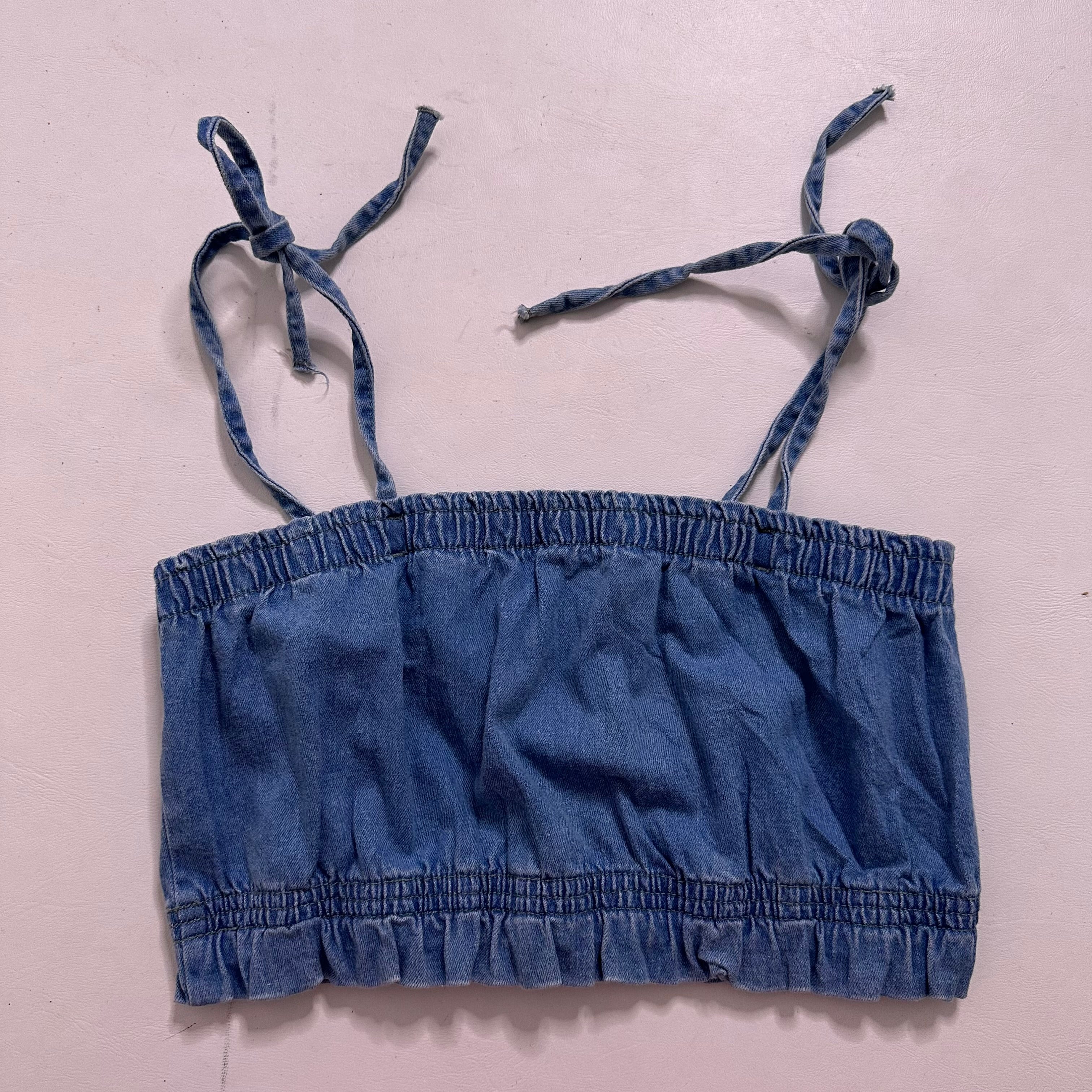 Denim crop top with bow tie straps
