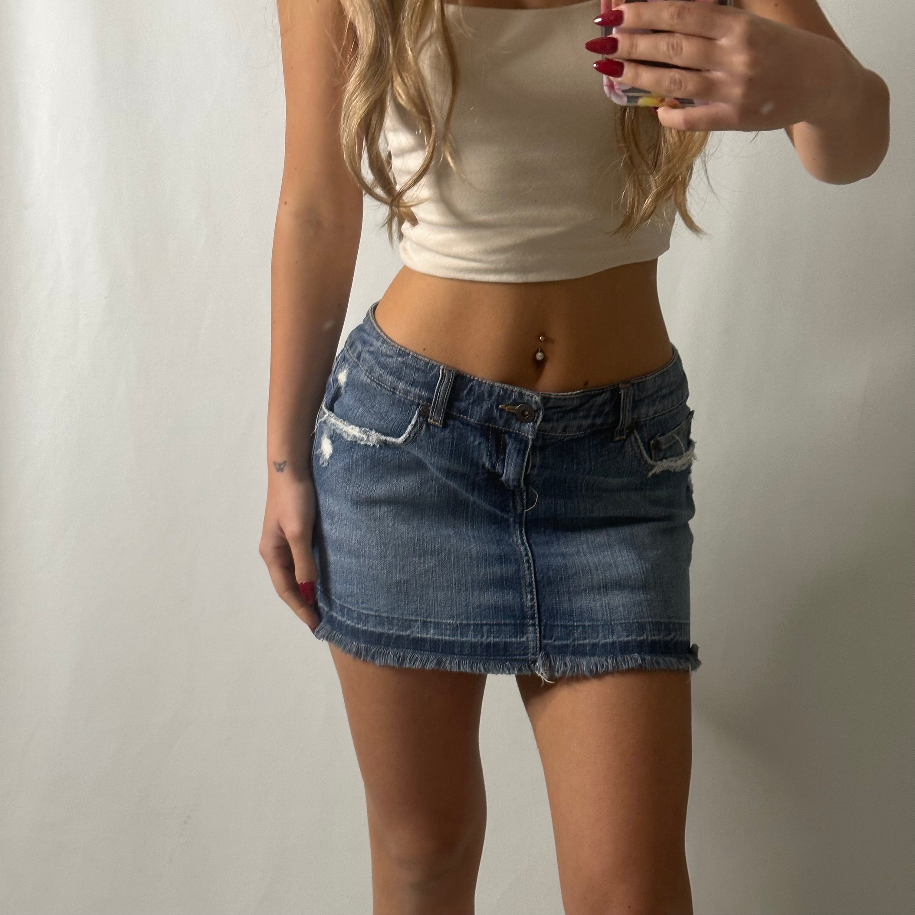 Low rise mini denim skirt