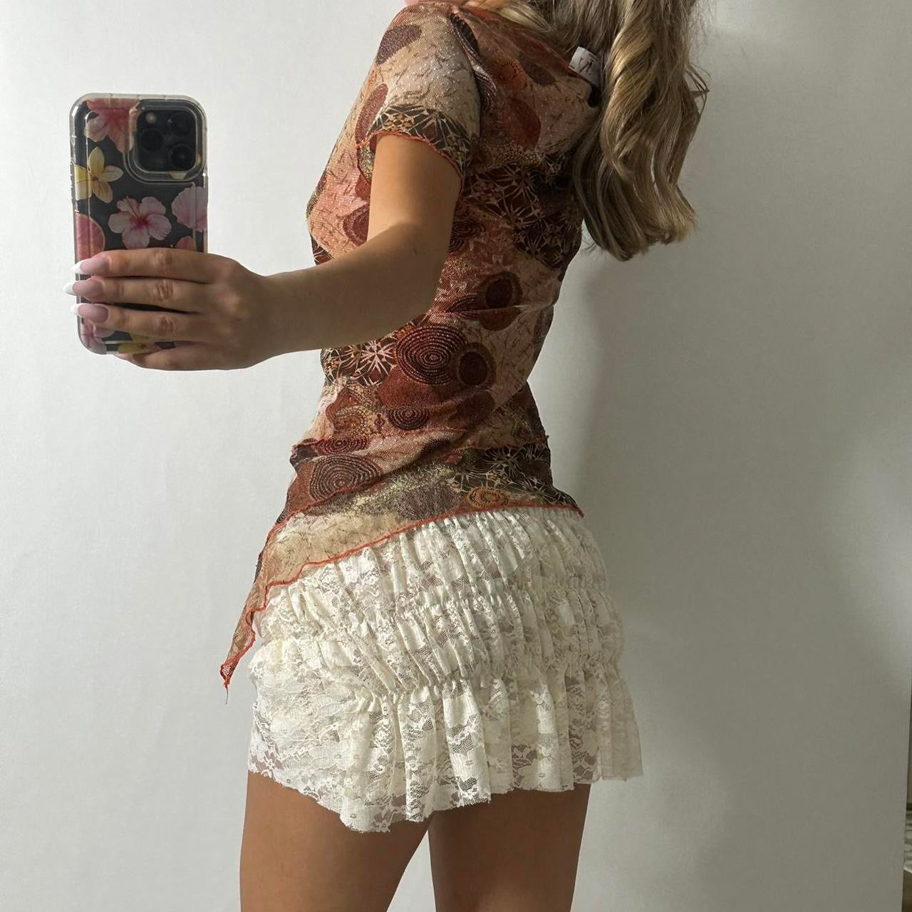 Mesh asymmetrical top