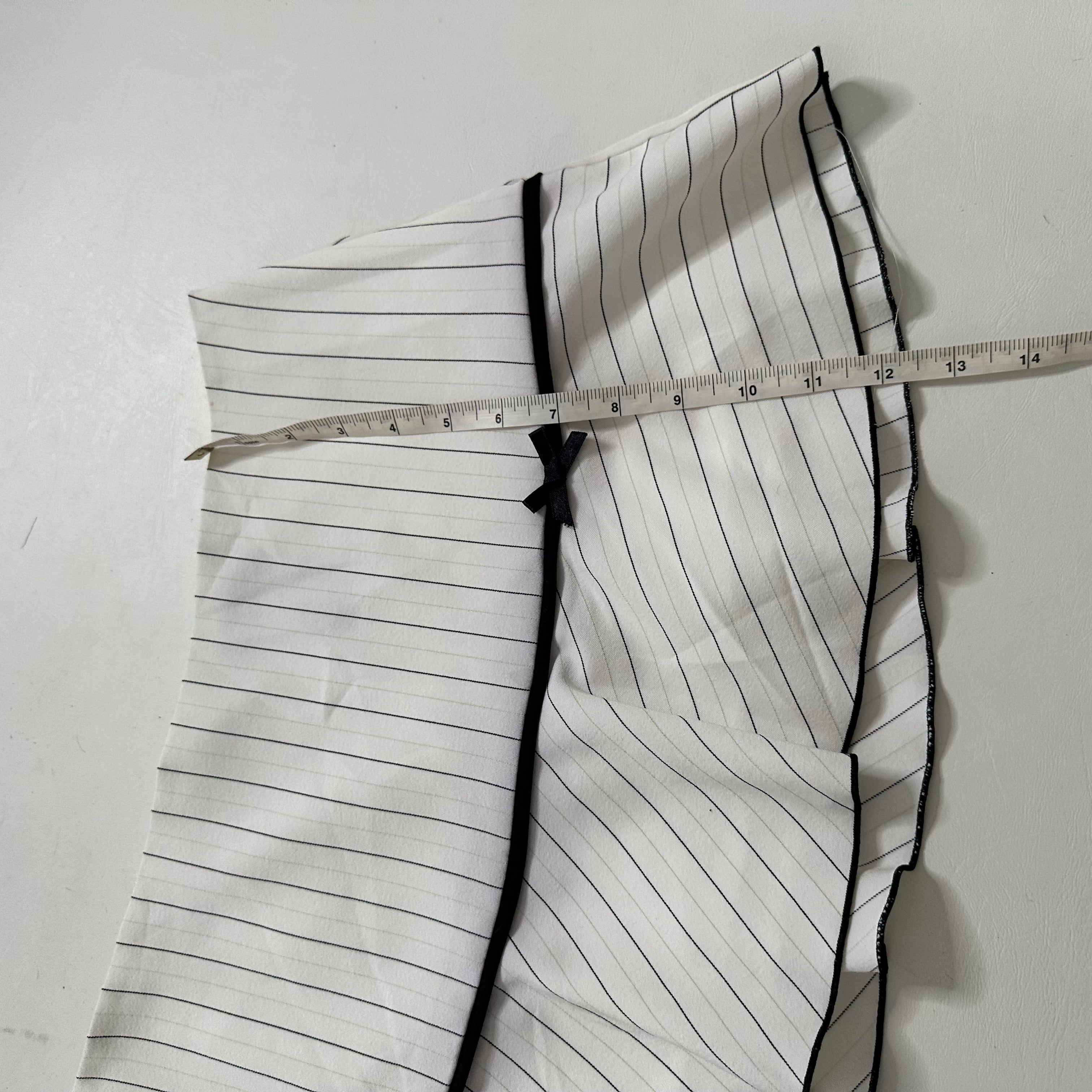 White pinstriped mini skirt with bow