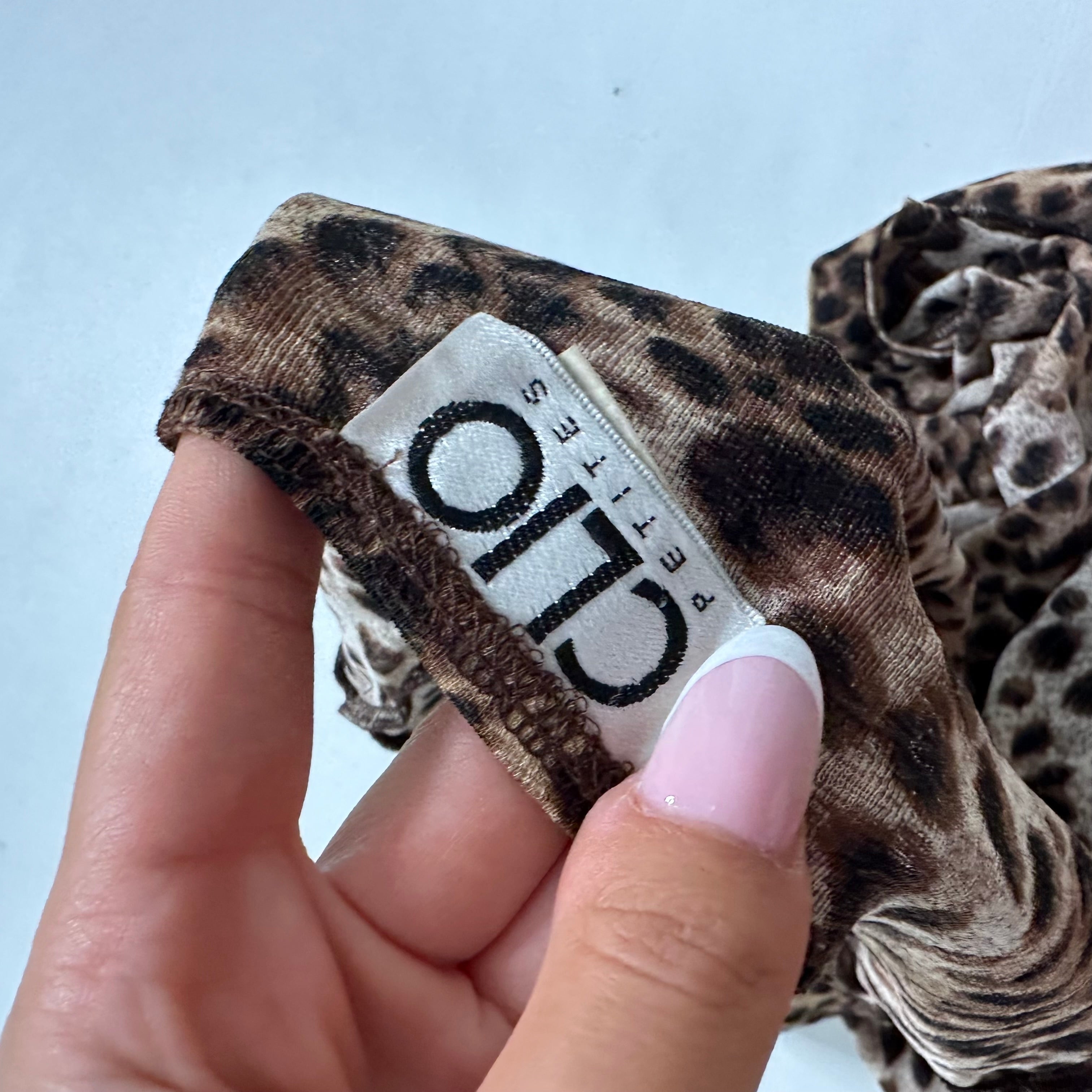 Leopard mesh ruffle flare sleeve top