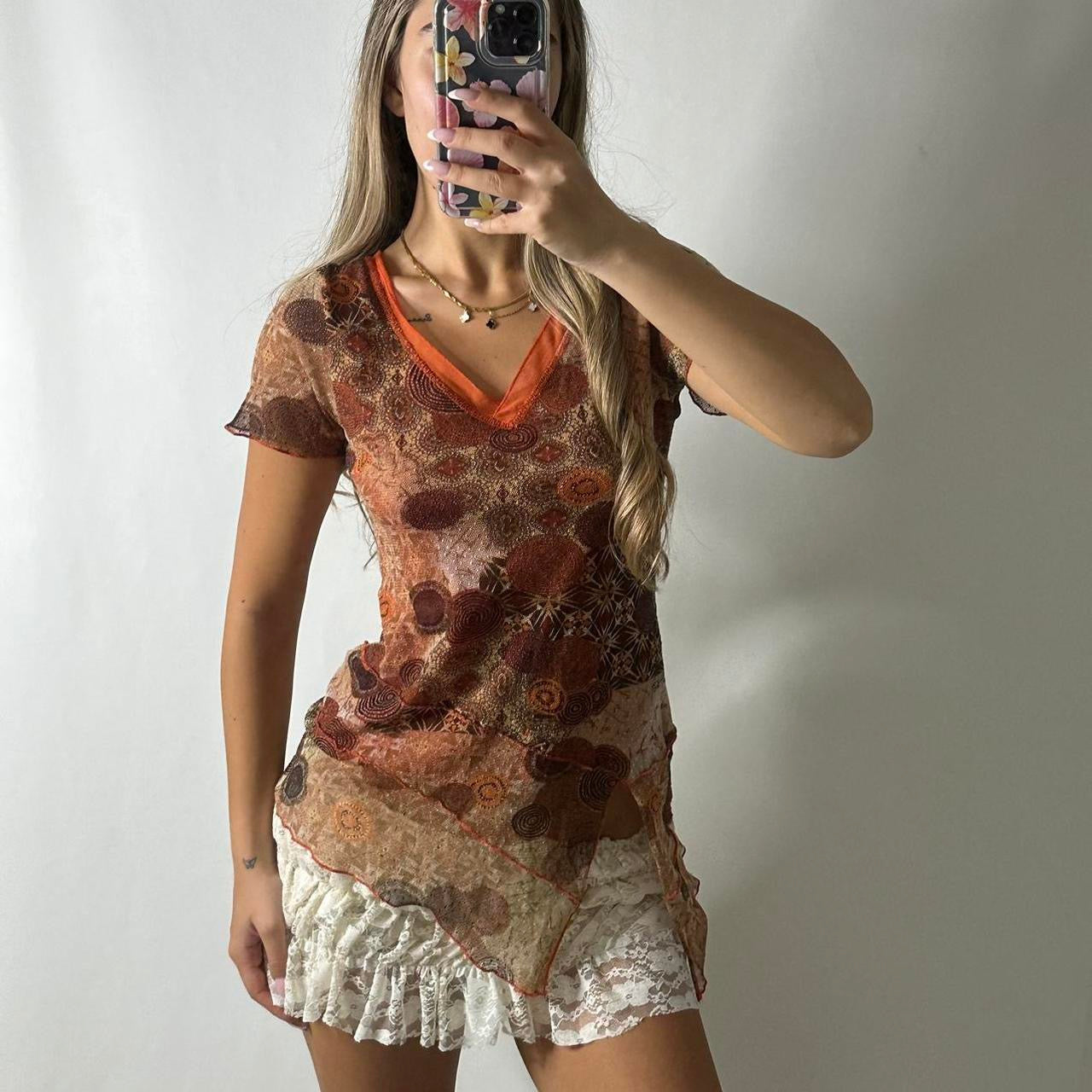 Mesh asymmetrical top