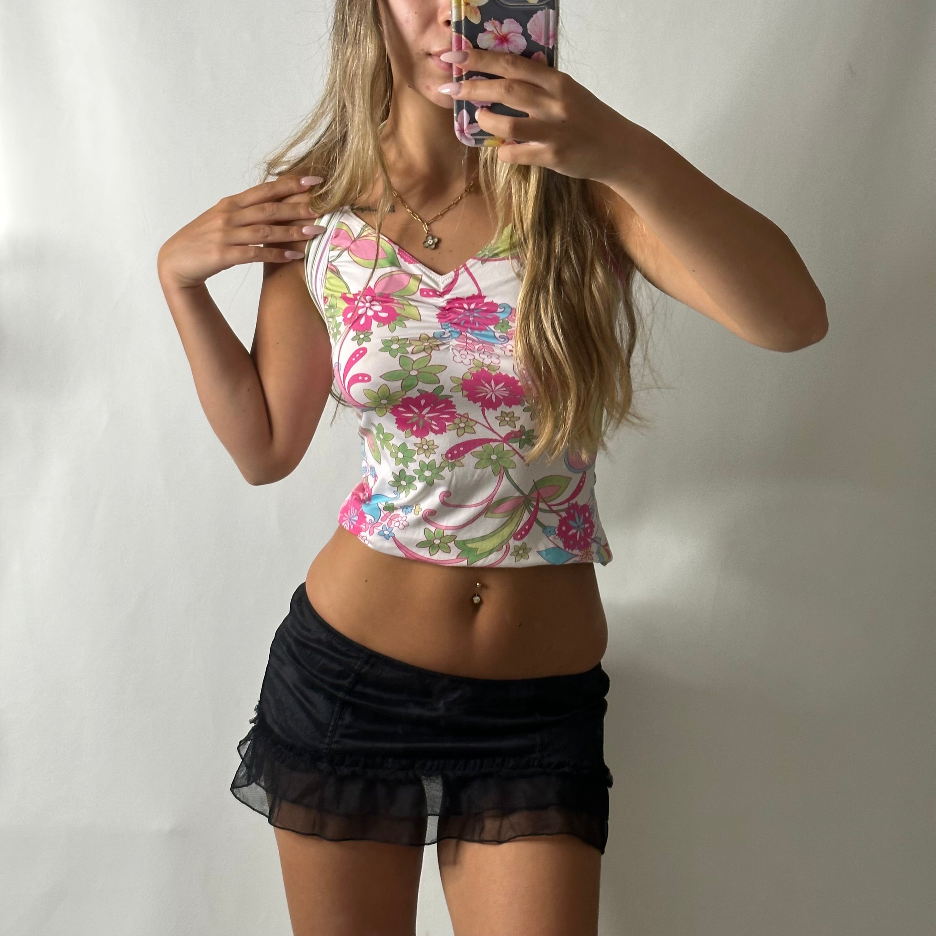 Viral Victoria’s Secret black low rise mini skirt with bow detail