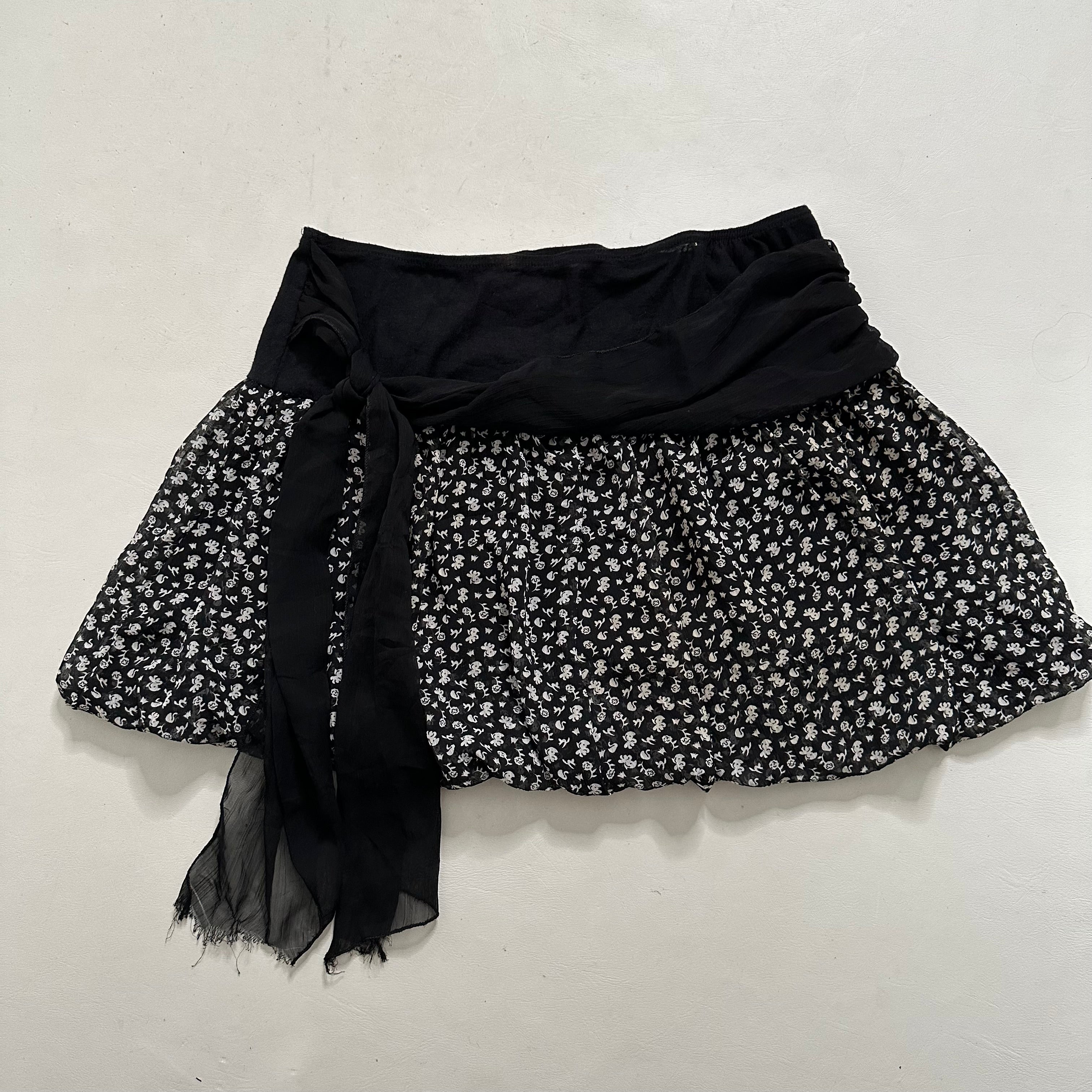Mesh tie up mini skirt