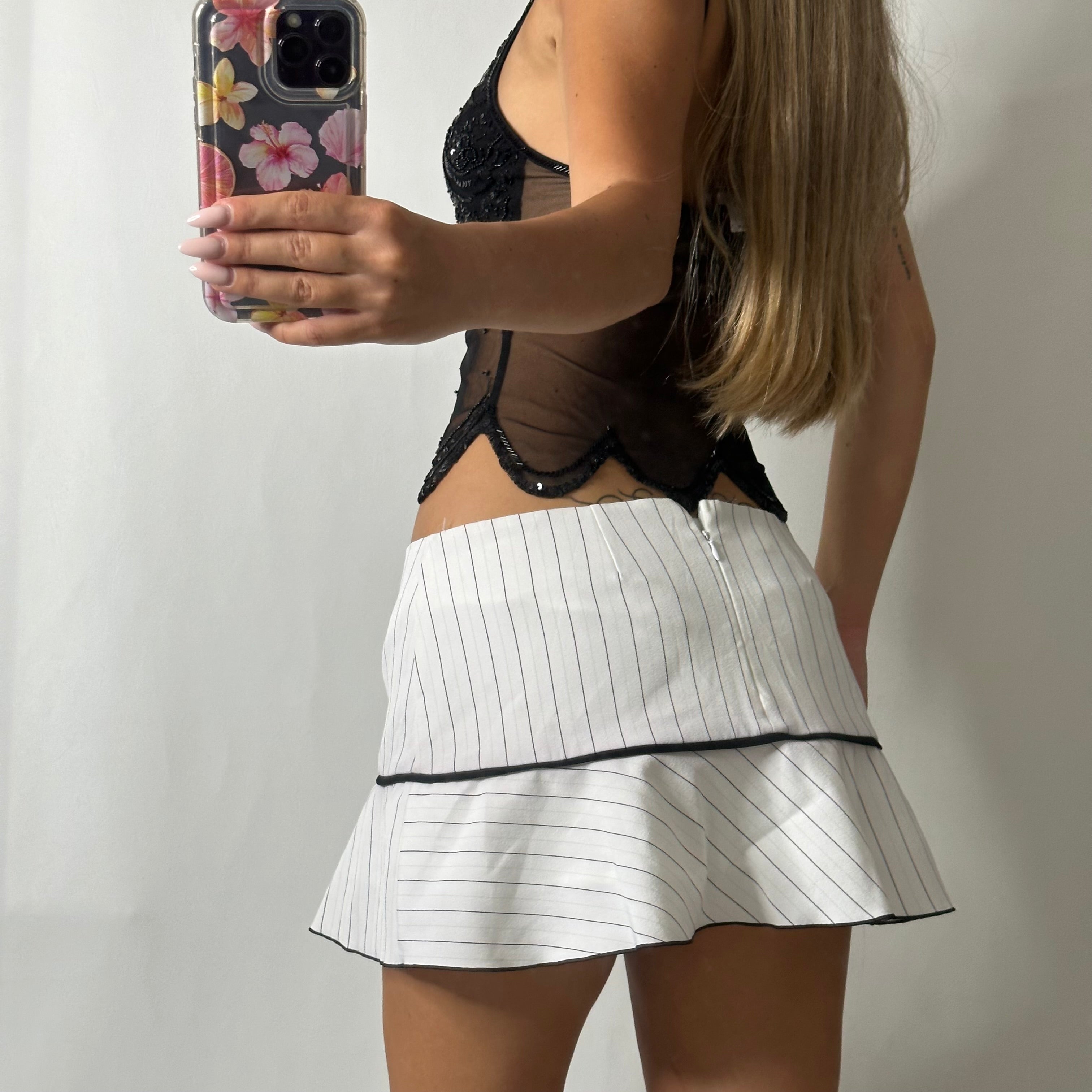 White pinstriped mini skirt with bow