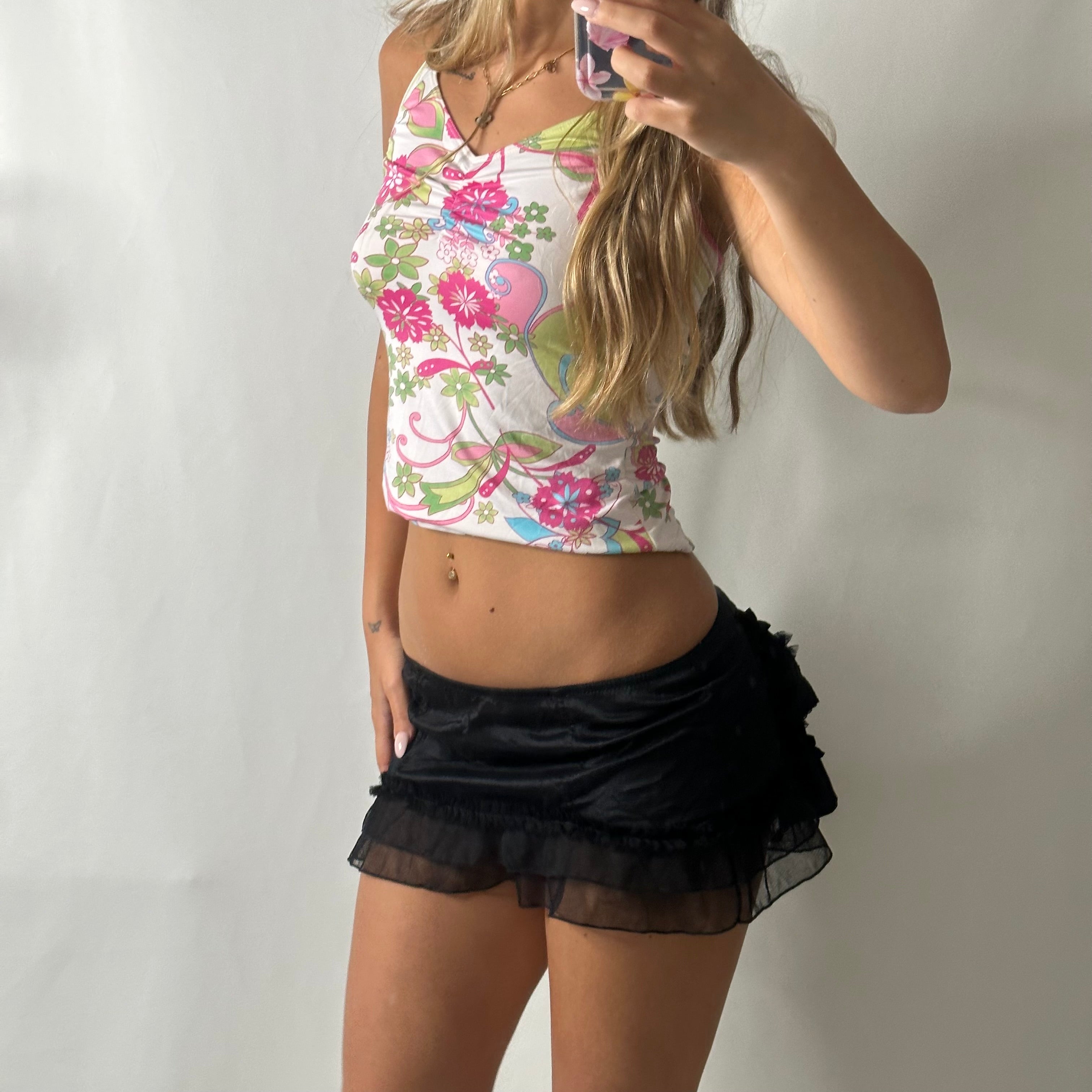 Viral Victoria’s Secret black low rise mini skirt with bow detail